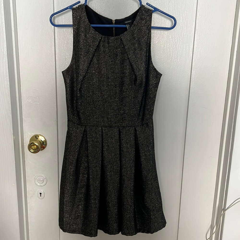Sheath like black and gold dress